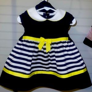 Eye catching Beautiful Navy blue and white with yellow trim dress with bloomers!